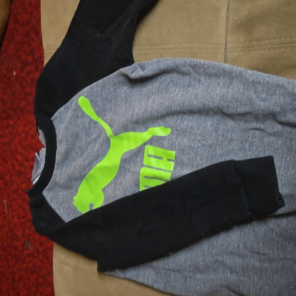 Puma jumper in black and gray with green logo. Size 18 month